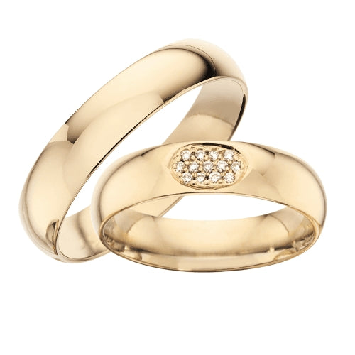 Eksklusive Scrouples vielsesringe i 8 eller 14 karat guld med 13 diamanter i oval indfatning, 5 mm brede.